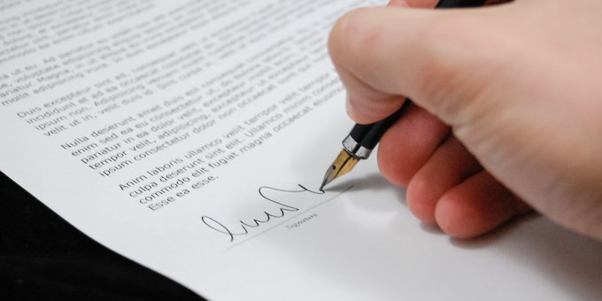 betekenis delegeren, handtekening onder een document